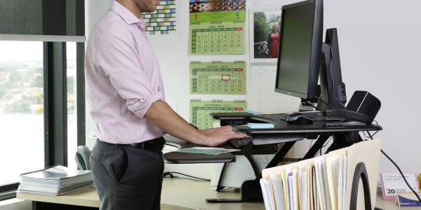 To stand or sit at your office desk?… that is the question